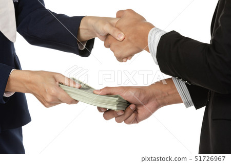 Businessmen making handshake with money in hands Businessmen making handshake with money in hands 51726967