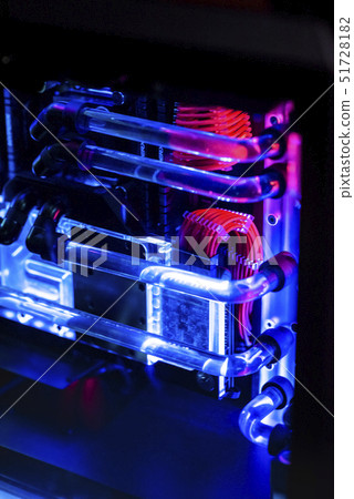 Inside a high performance computer. Computer circuit board and CPU cooling fans illuminated by Inside a high performance computer. Computer circuit board and CPU cooling fans illuminated by 51728182