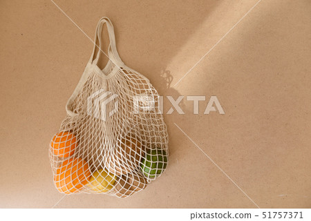 Eco friendly reusable mesh string knitted shopping bag with fruits and vegetables, zero waste 51757371