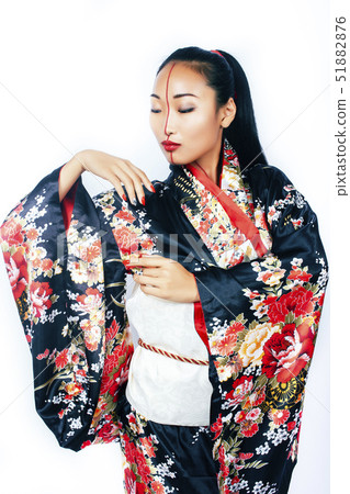 young pretty real geisha in kimono with sakura and decoration on white background isolated 51882876
