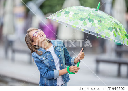 Portrait of beautiful young pre-teen girl with 51946502
