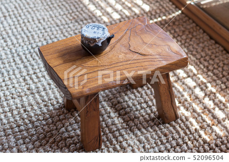 Herbal medicine containers on a wooden tea table (inside a traditional Korean house) Herbal medicine containers on a wooden tea table (inside a traditional Korean house) 52096504