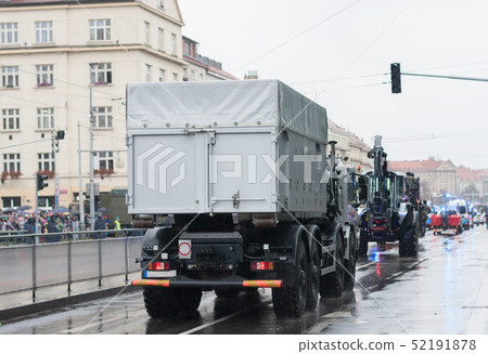 Police workers are riding police truck 52191878