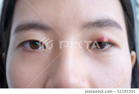 Close up of Asian young woman with brown eye with 52193301