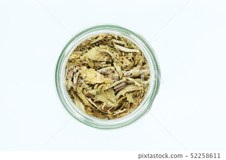 dried stevia leaves in bottle isolated on white 52258611