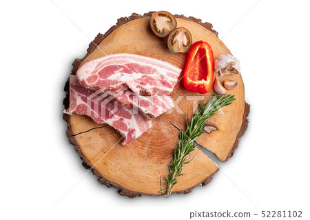Raw fresh pork brisket slices on wooden board 52281102