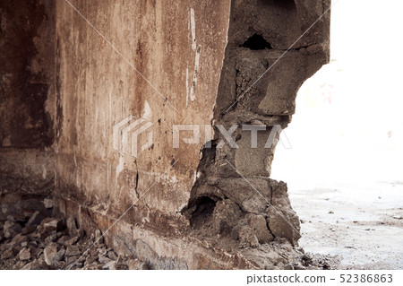 Fractured concrete wall Fractured concrete wall 52386863