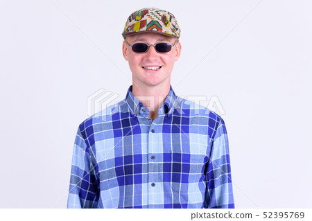 Happy young hipster man with sunglasses smiling 52395769