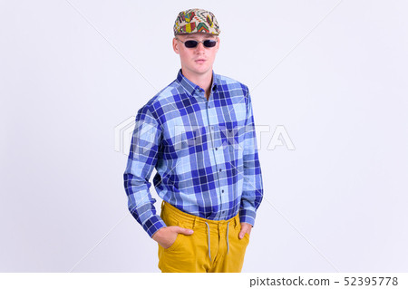 Portrait of young handsome hipster man with sunglasses as artist 52395778