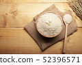 Top view of jasmine rice with jasmine flower 52396571