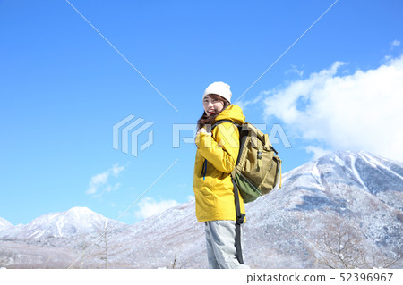Woman enjoying winter leisure Woman enjoying winter leisure 52396967