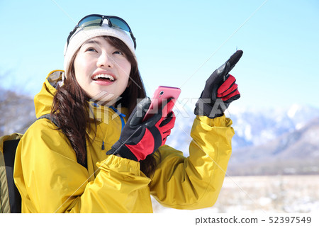 Woman enjoying winter leisure 52397549