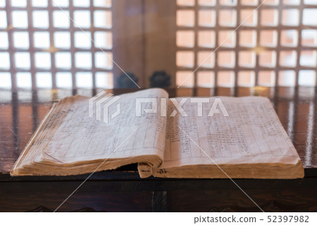 Ancient books on the desk 52397982