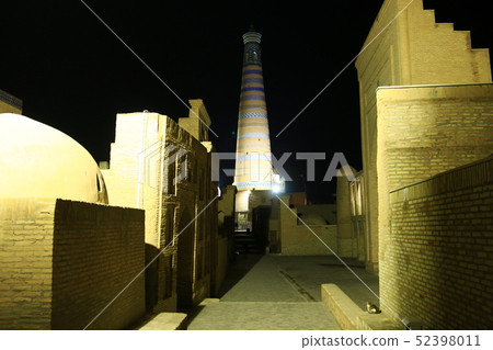 Journey on the Silk Road Uzbekistan Hiva in the night The minarets of Islam Hoja Medrese rising in the dark 52398011