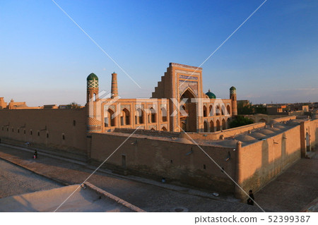 Journey on the Silk Road Uzbekistan Khiva Muhammad Rahim Han Medresé in the Sunset 52399387