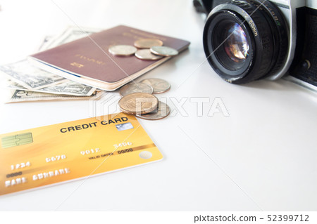 Credit card with dollar bills and coils, passport 52399712