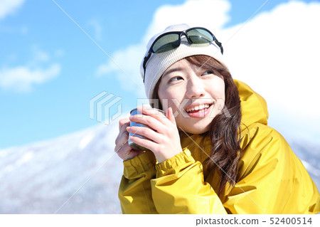 Woman enjoying winter leisure 52400514
