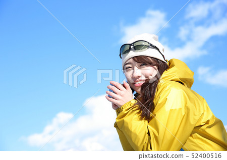 Woman enjoying winter leisure 52400516