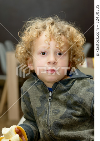 portrait of young blond curly boy portrait of young blond curly boy 52430335