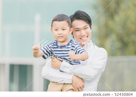 father and child, grinning, smiling 52430804