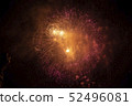 Bright salute in the black sky. Fireworks against the dark sky. 52496081
