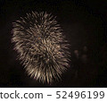 Fireworks against the dark sky. Bright salute in the black sky, 52496199