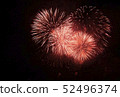 Fireworks against the dark sky. Bright salute in the black sky, 52496374