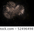 Fireworks against the dark sky. Bright salute in the black sky, 52496498