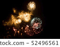 Fireworks against the dark sky. Bright salute in the black sky, 52496561