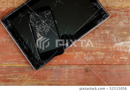 Tablet and smart phone with broken glass screen Tablet and smart phone with broken glass screen 52515056