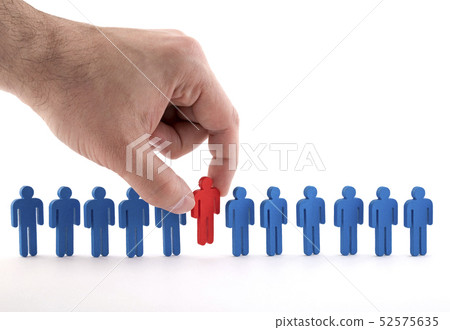 Man holds an employee in his hand Man holds an employee in his hand 52575635