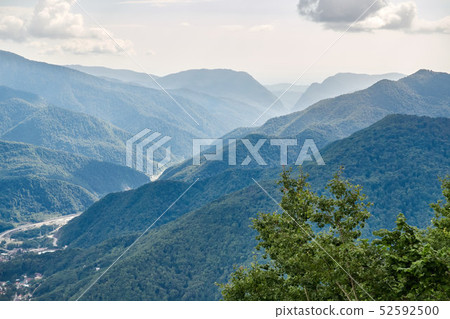 The gorge among the mountains with green slopes. 52592500