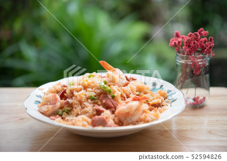 Delicious Thai fried rice with shrimp on wooden Delicious Thai fried rice with shrimp on wooden 52594826