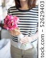 Woman with a bouquet 52629403