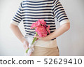 Young woman with a bouquet 52629410