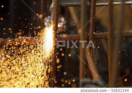 Metal cutting with acetylene torch. 52631144