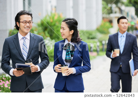 Business colleagues talking in the city 52642843