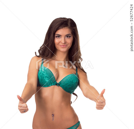 Young sexy woman in black undies gesturing OK signal, isolated image. Young sexy woman in black undies gesturing OK signal, isolated image. 52677424