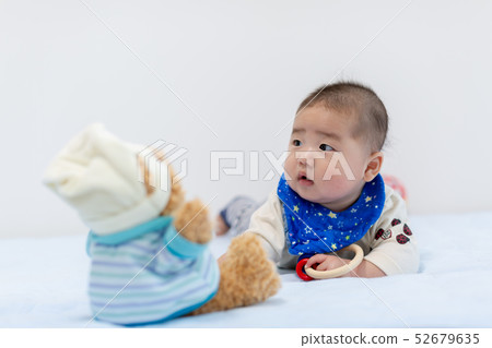 A prone baby A prone baby 52679635