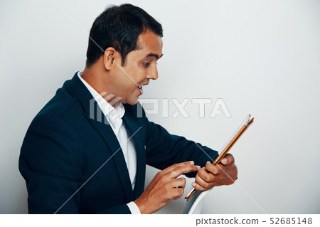 Businessman using tablet pc 52685148