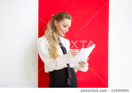 Student model with long hair is preparing for the exam. 52699984