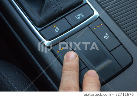 Modern car central console with seat and steering heating controls 52711676