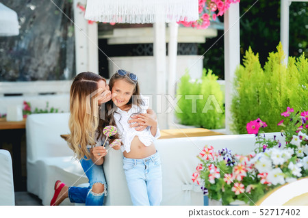 Another world vacation. Portrait of smiling modern mother and child travellers in Venice, Italy in Another world vacation. Portrait of smiling modern mother and child travellers in Venice, Italy in 52717402