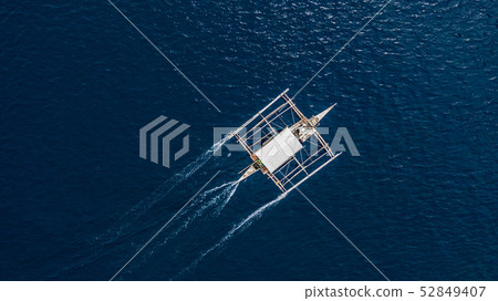 Aerial view of Filipino boats floating on sea 52849407