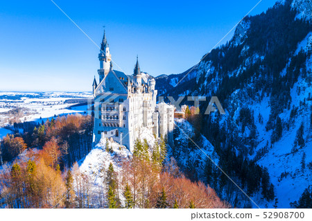 Beautiful view of world-famous Neuschwanstein Castle, the nineteenth-century Romanesque Revival Beautiful view of world-famous Neuschwanstein Castle, the nineteenth-century Romanesque Revival 52908700