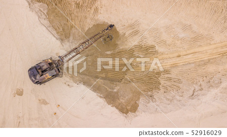 Top down view of construction site with machinery, excavation. Top down view of construction site with machinery, excavation. 52916029