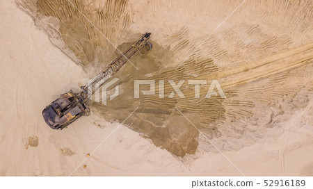 Top down view of open pit mine, extractive industry for soil and sand 52916189