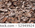 Shredded pine bark for mulching. 52949924
