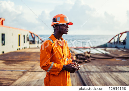 Tired Seaman AB or Bosun on deck of vessel or ship Tired Seaman AB or Bosun on deck of vessel or ship 52954168