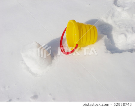 Kids winter play objects. Bucket on a snow Kids winter play objects. Bucket on a snow 52958743
